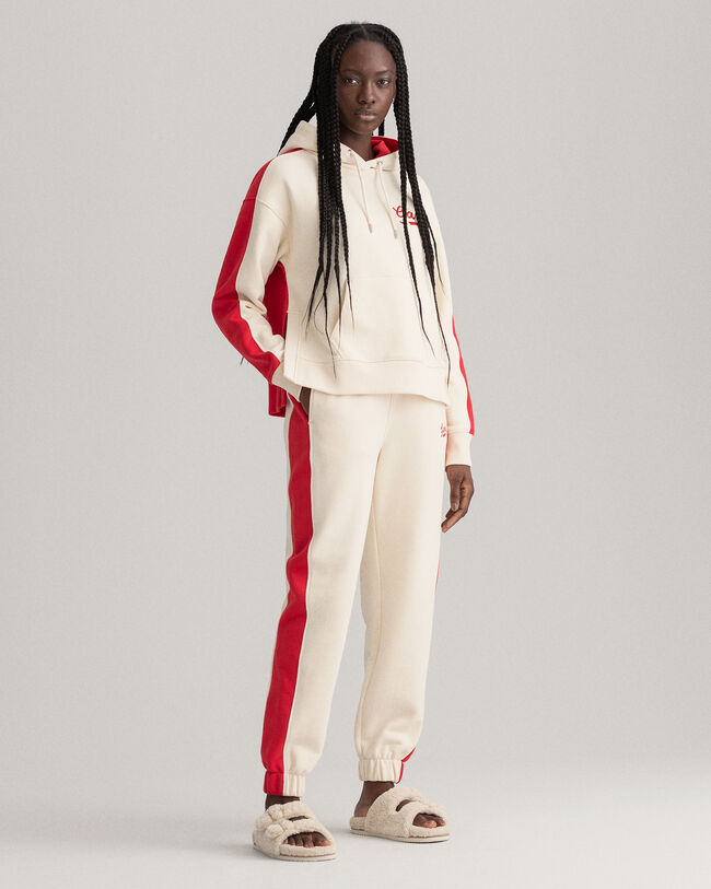 Moniv&auml;riset collegehousut