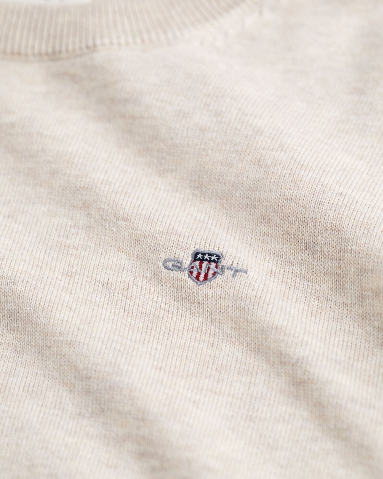 Teens-malliston Shield Classic -puuvillaneulepusero, jossa pyöreä pääntie