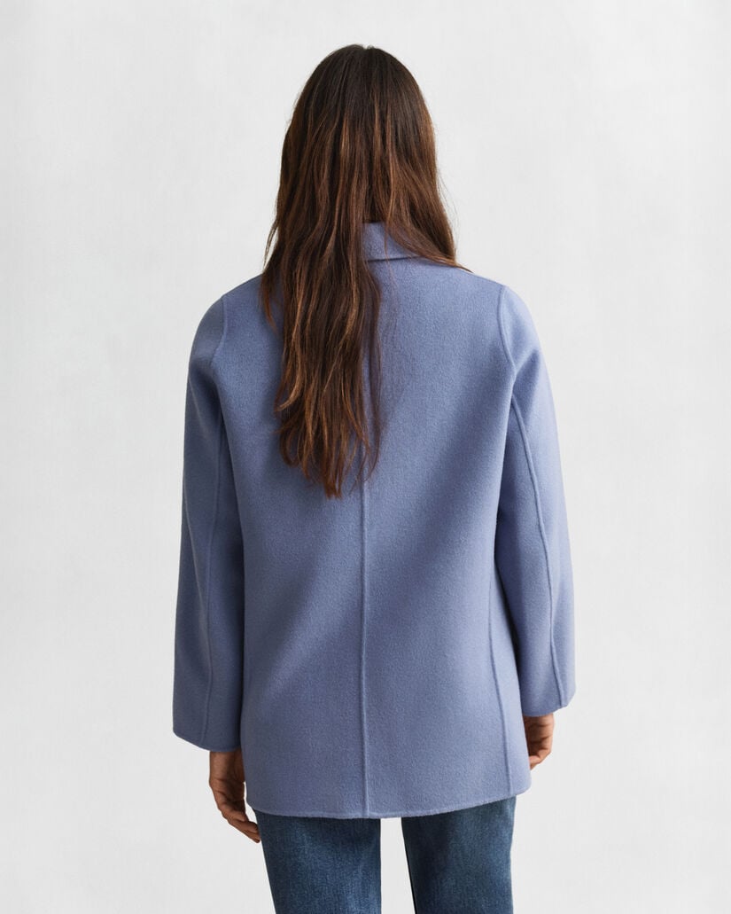 Käsin tikattu kansitakki