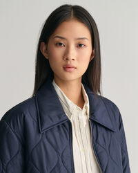 Kauluksellinen tikkitakki