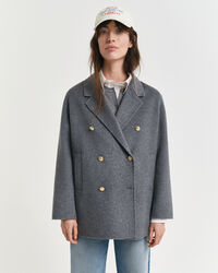 Käsin tikattu kansitakki