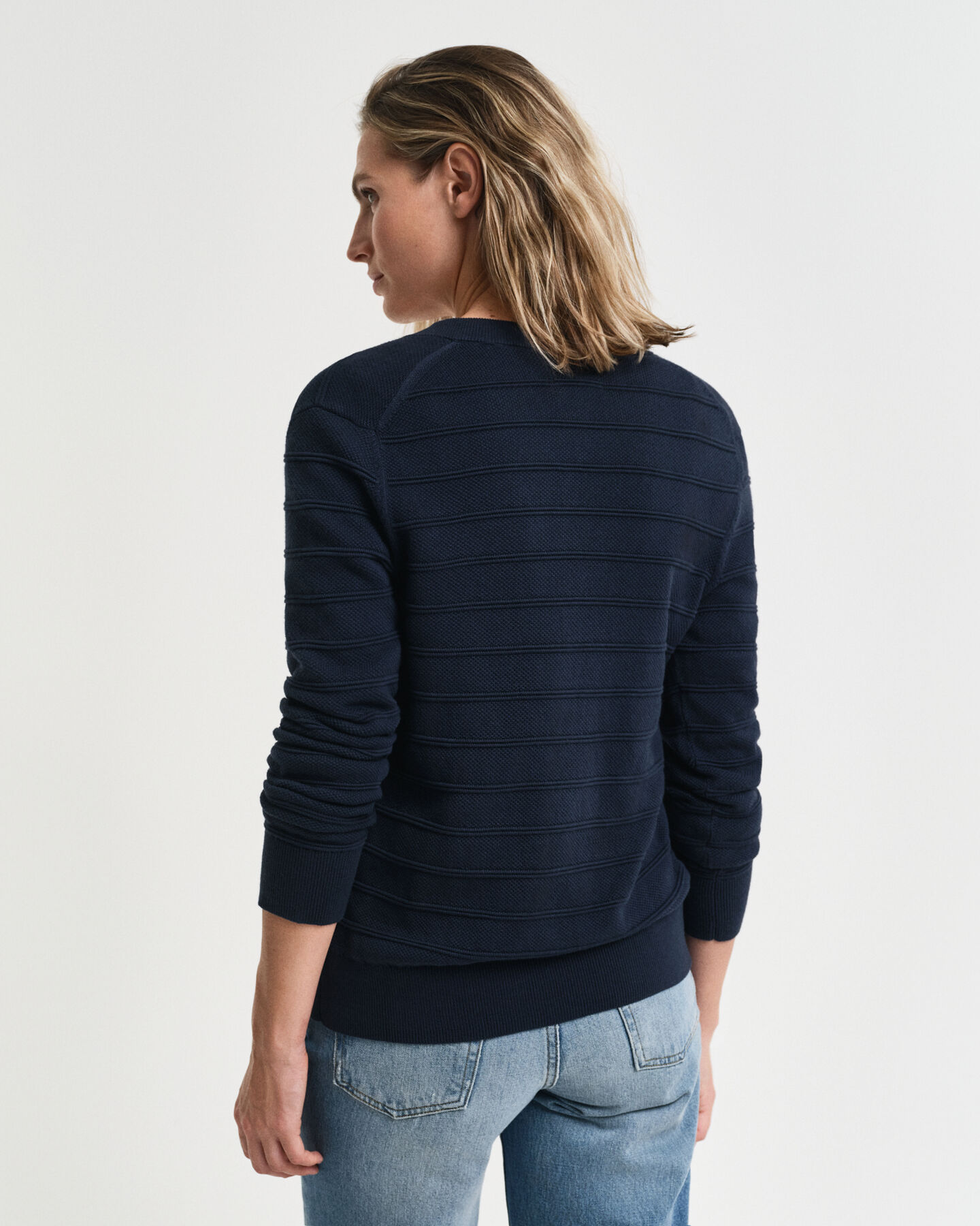 Kohopintainen puuvillaneuletakki