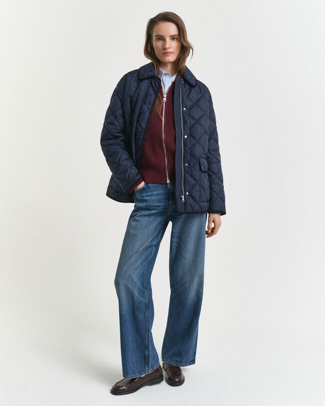 Vakosamettisomisteinen tikkitakki