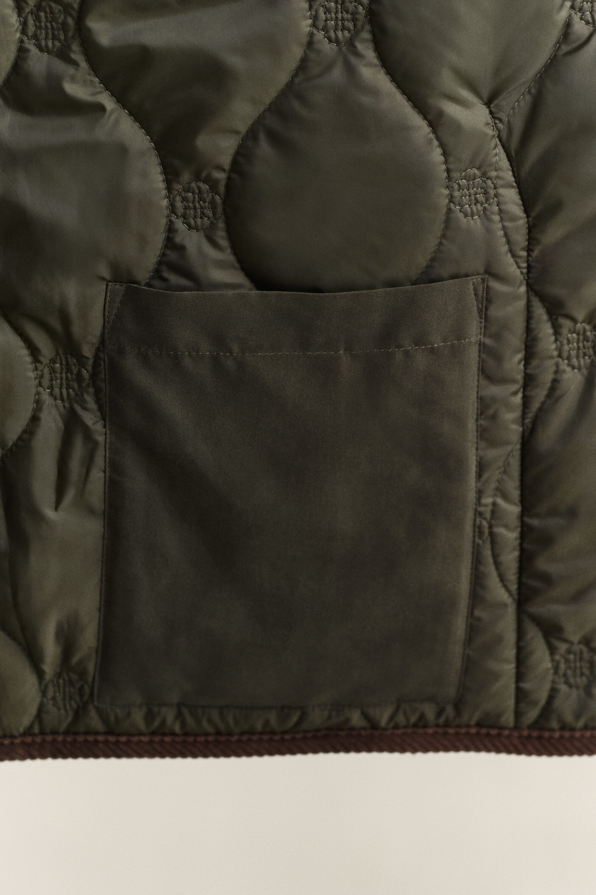 Monogrammi-tikkitakki