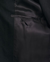 Hyvin istuva klassinen päällystakki villasta