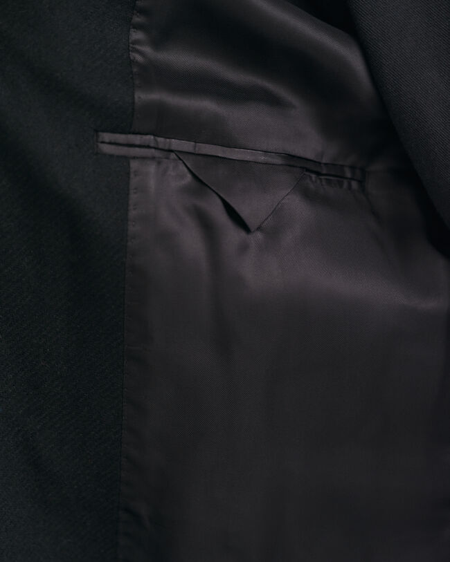 Hyvin istuva klassinen päällystakki villasta