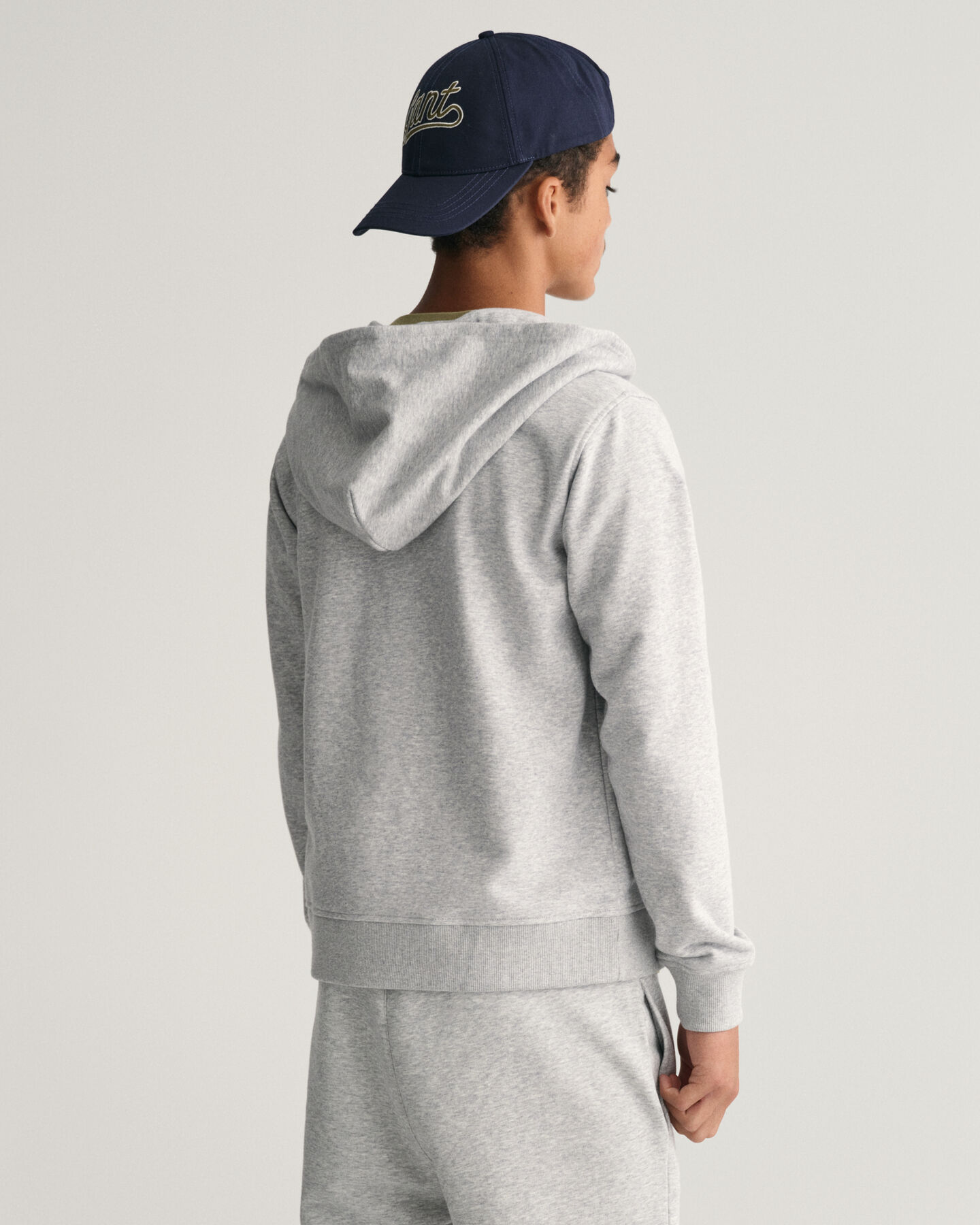 Teens-malliston Shield‑vetoketjuhuppari