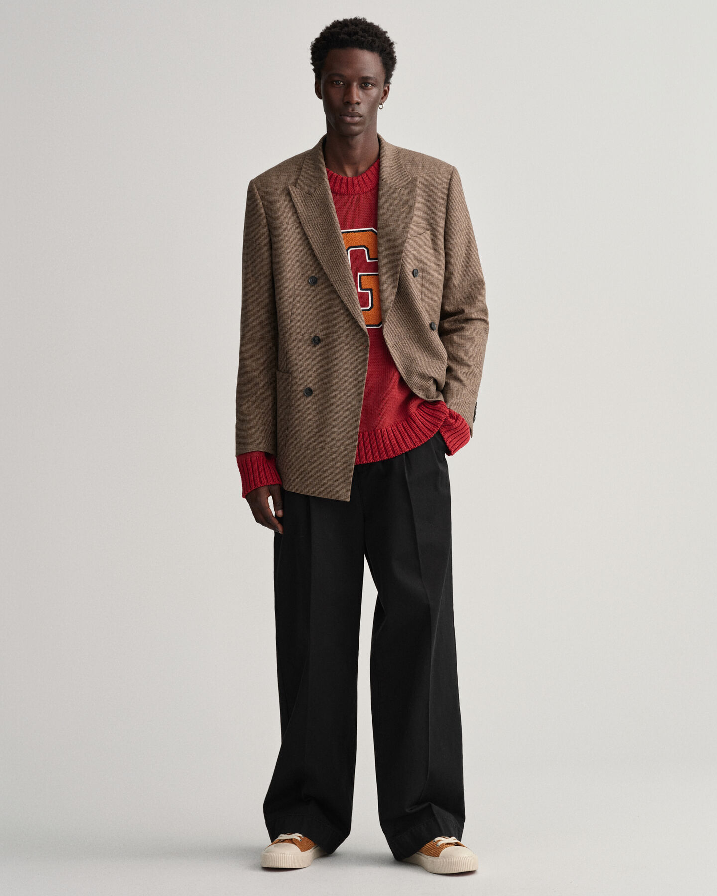 Oversized fit ‑mitoitettu Letterman-neulepusero, py&ouml;re&auml; p&auml;&auml;ntie