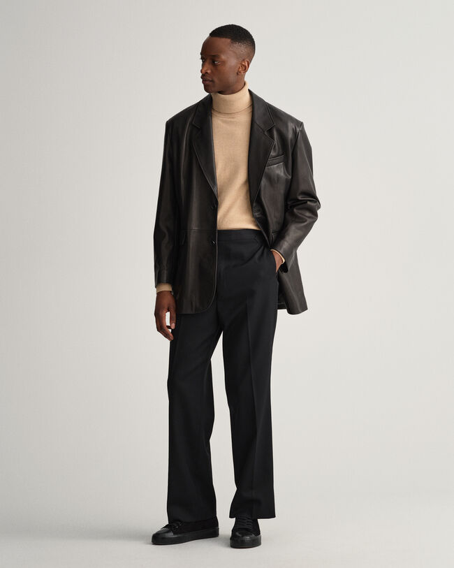 Puuvillan ja kašmirin sekoitteesta valmistettu pooloneulepusero