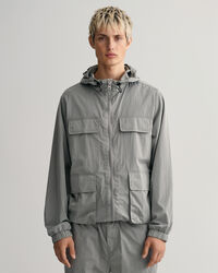 Nelitaskuinen hupputakki