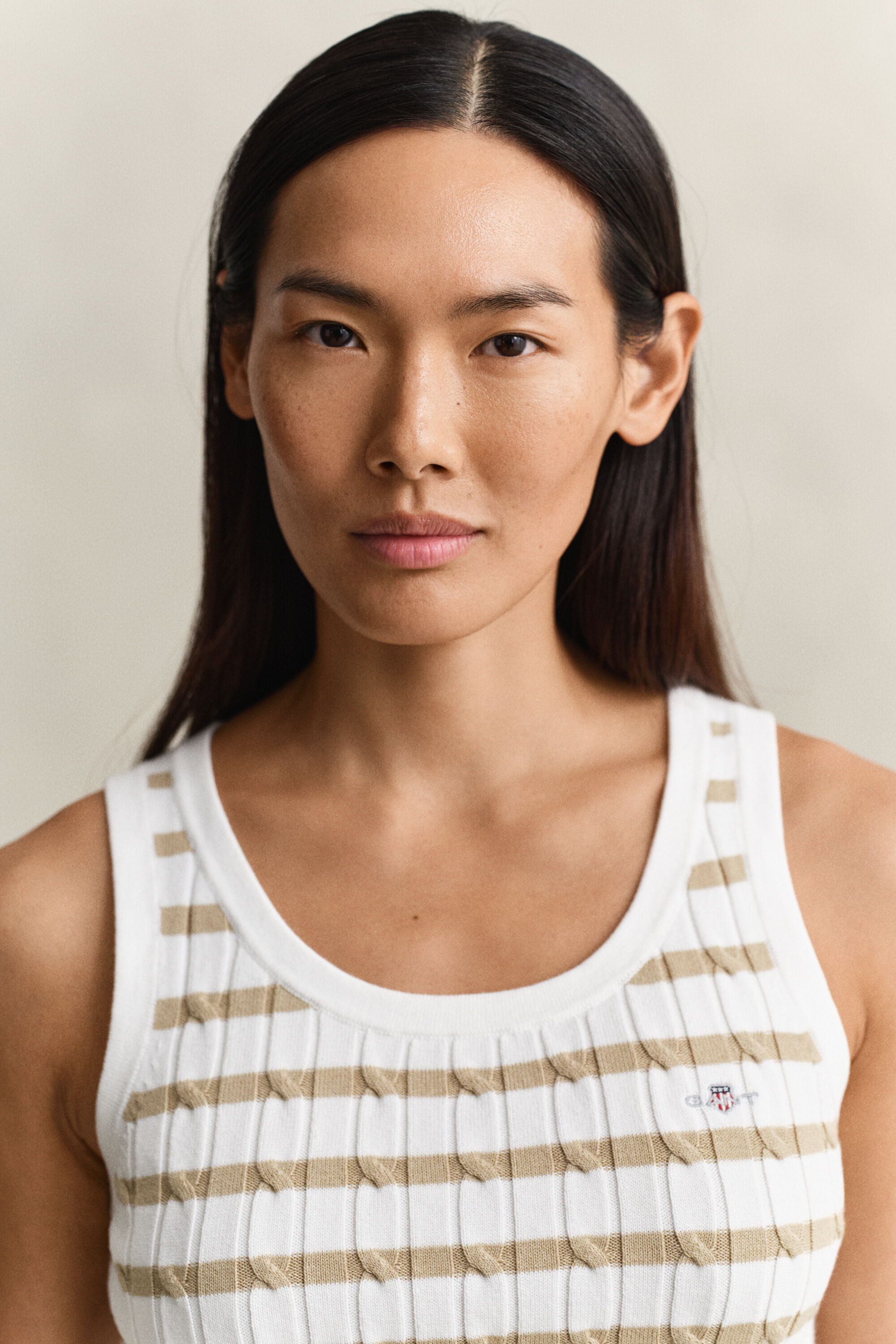 Raidallinen palmikkoneuletoppi