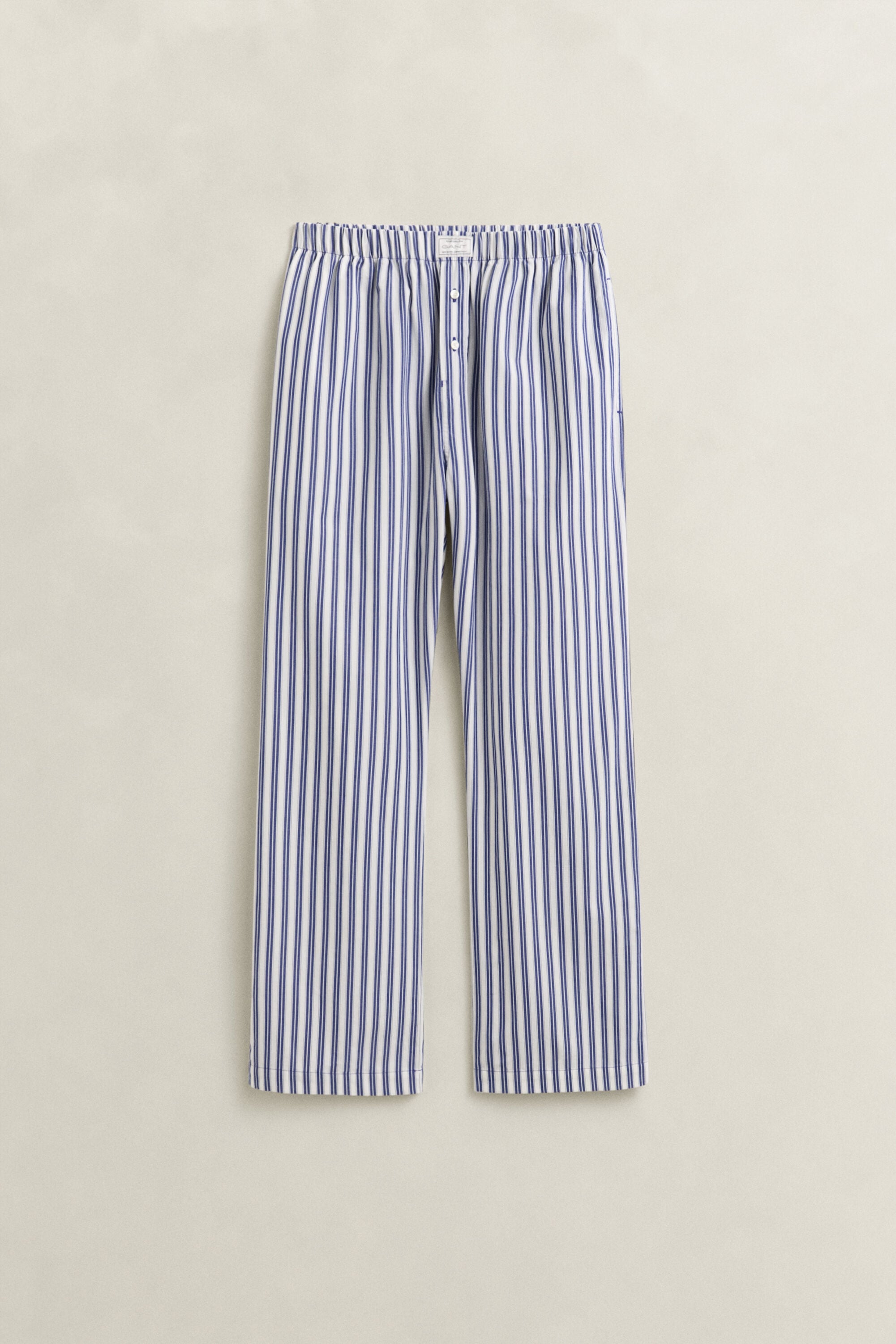 Raidalliset pyjamahousut