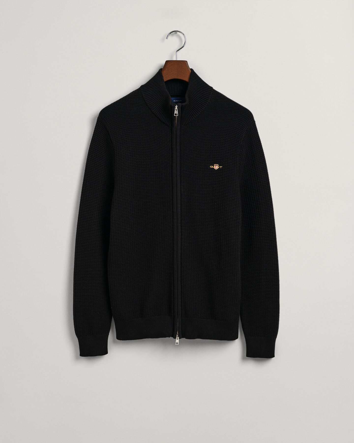 Kohopintainen puuvillaneuletakki