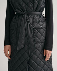 Pitk&auml; tikkiliivi