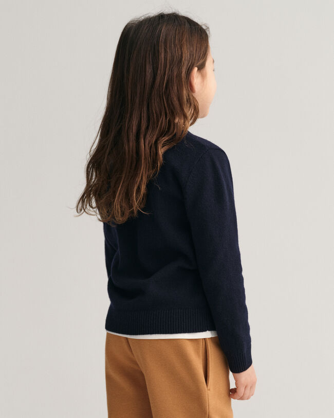 Kids-malliston Shield-lampaanvillaneule, jossa py&ouml;re&auml; p&auml;&auml;ntie