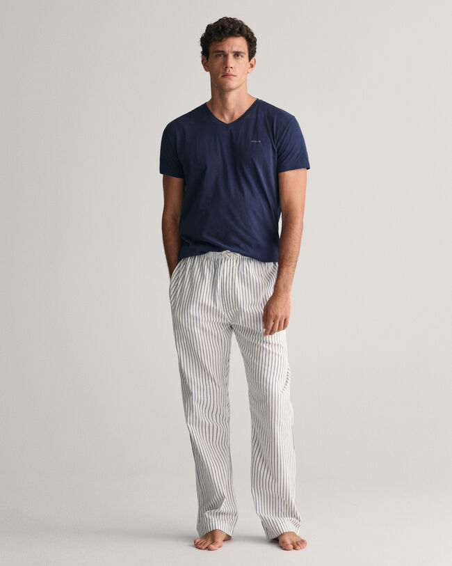 Raidalliset pyjamahousut