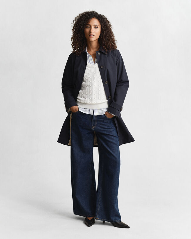 Joustava puuvillapalmikkoneule, jossa v‑pääntie