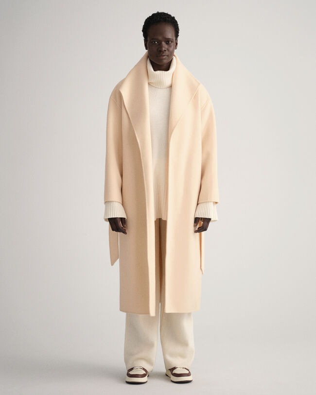 Käsin tikattu takki vyöllä