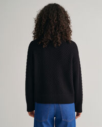 Palmikkopooloneule napituksella