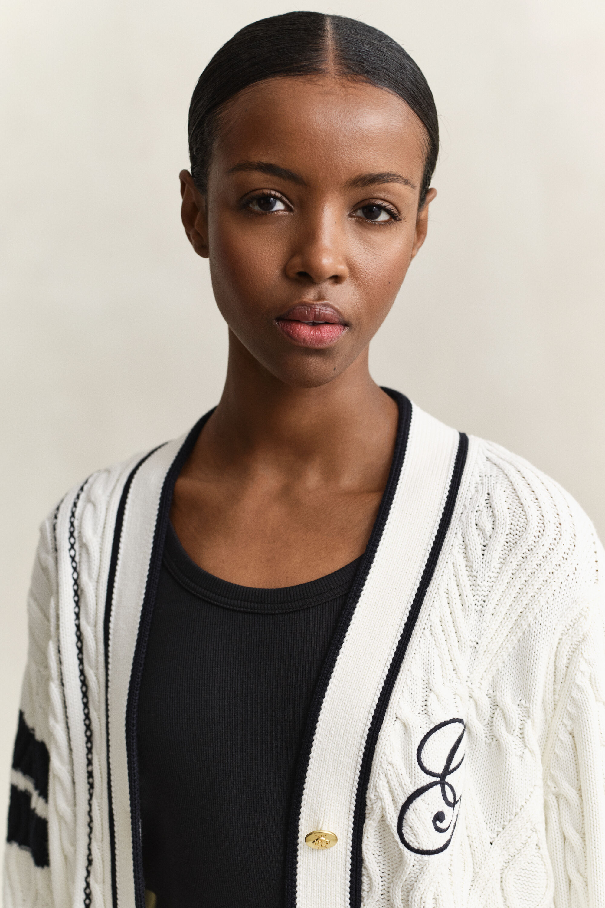 Sporttinen palmikkoneuletakki