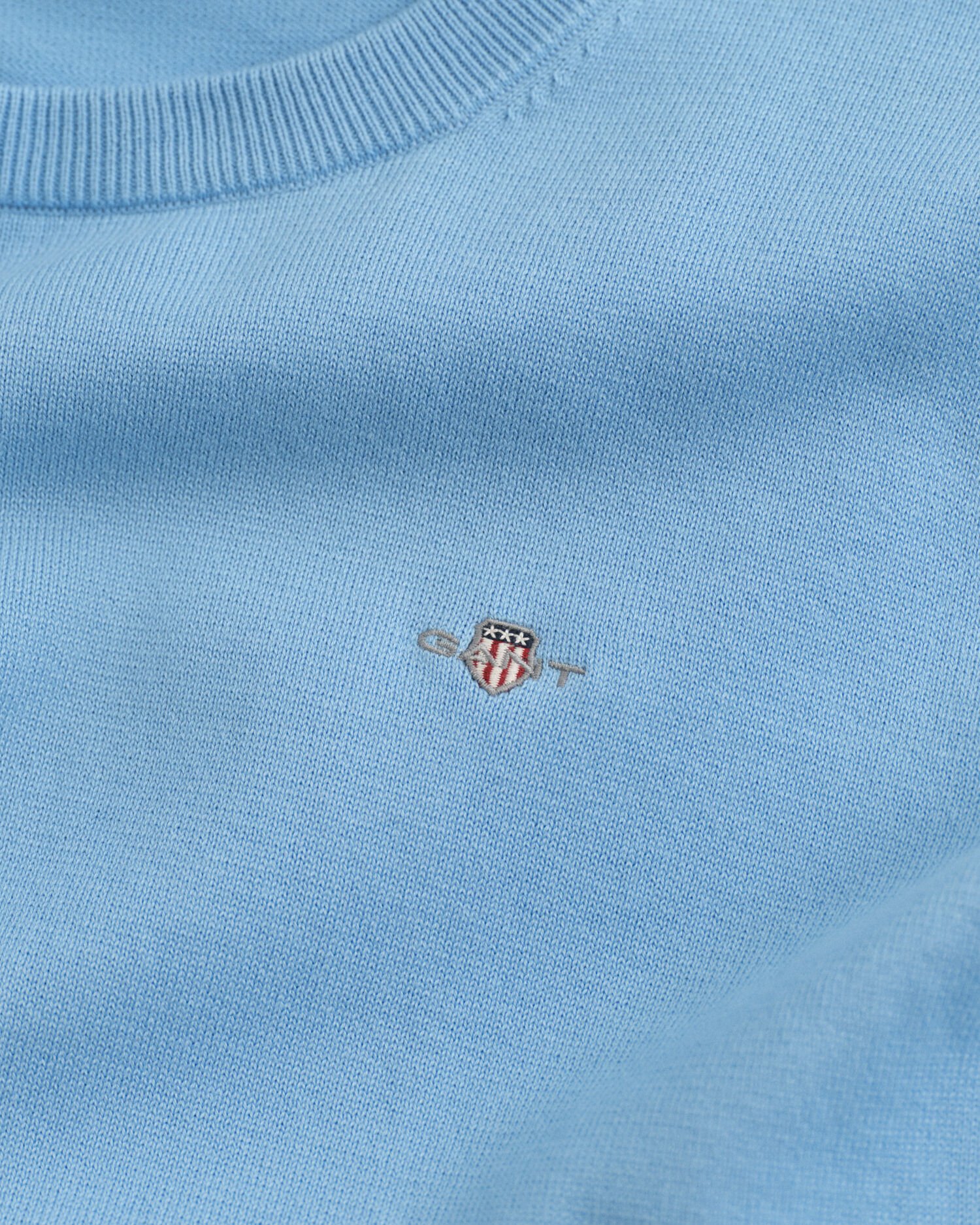 Teens-malliston Shield Classic -puuvillaneulepusero, jossa pyöreä pääntie