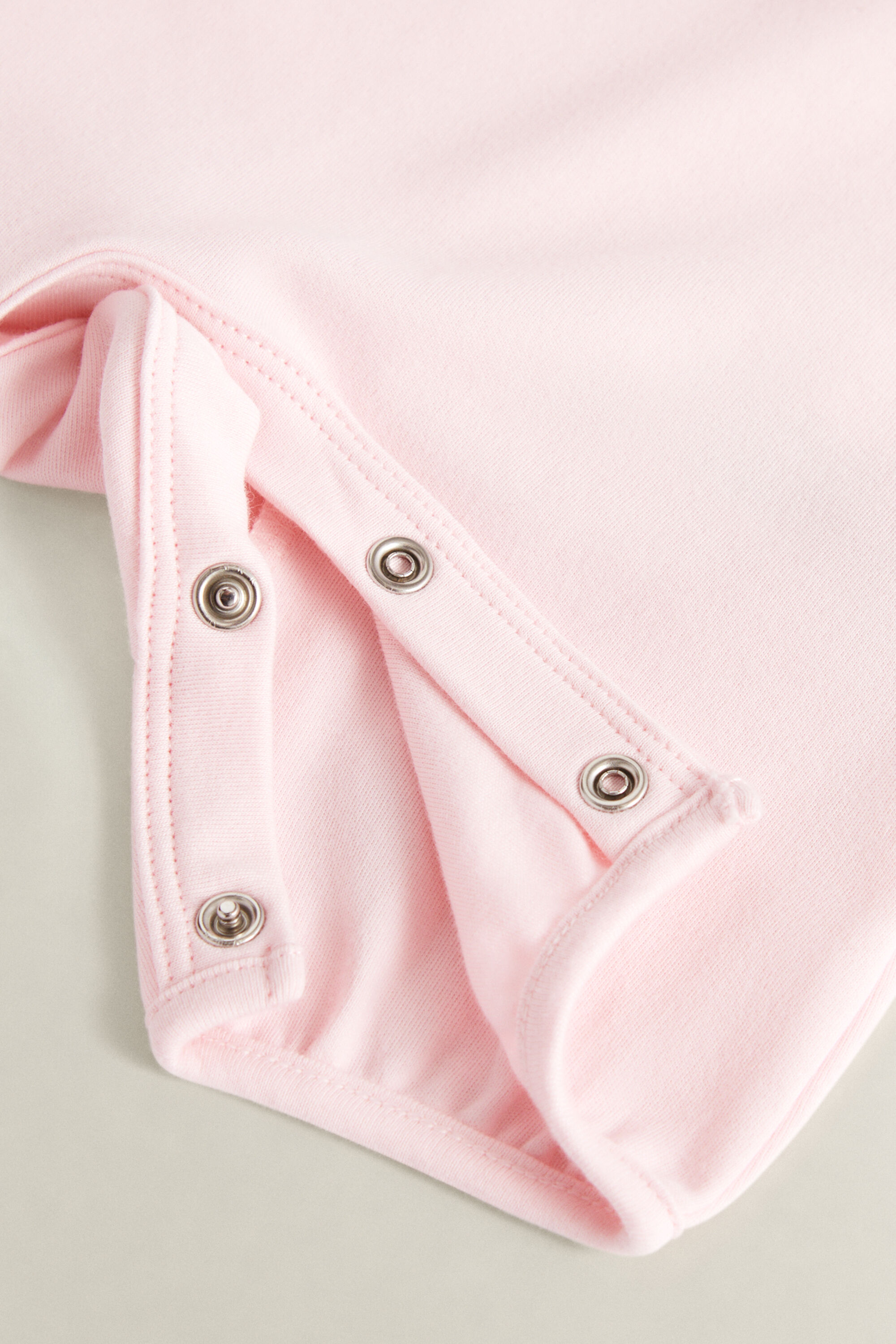 Baby Girl ‑malliston kukkakuvioinen potkupuku