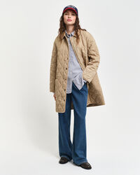 Vakosamettisomisteinen tikkitakki