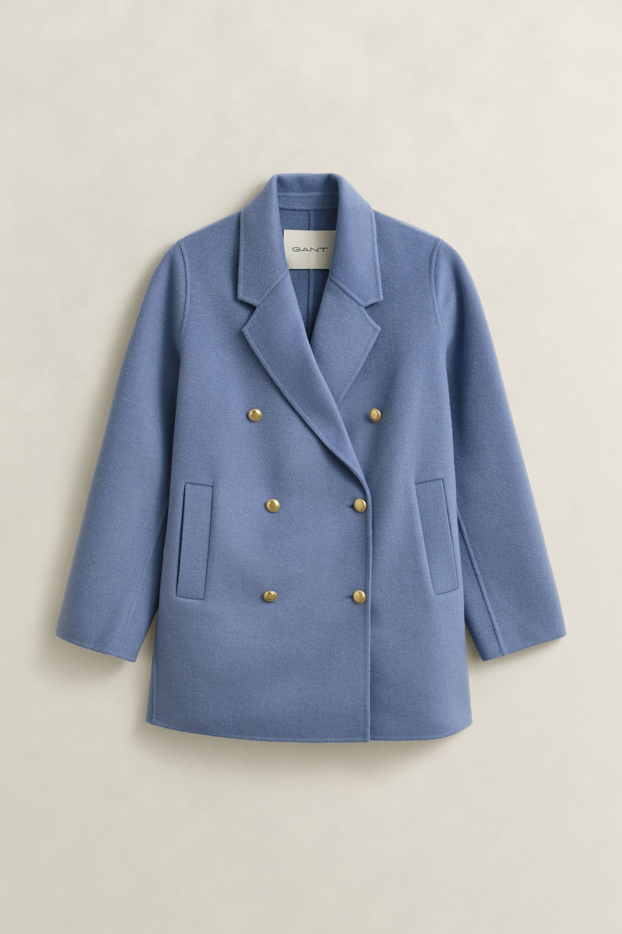 Käsin tikattu kansitakki