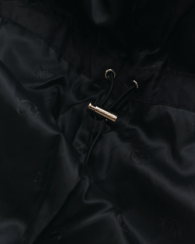 Kokopitkä untuvatakki