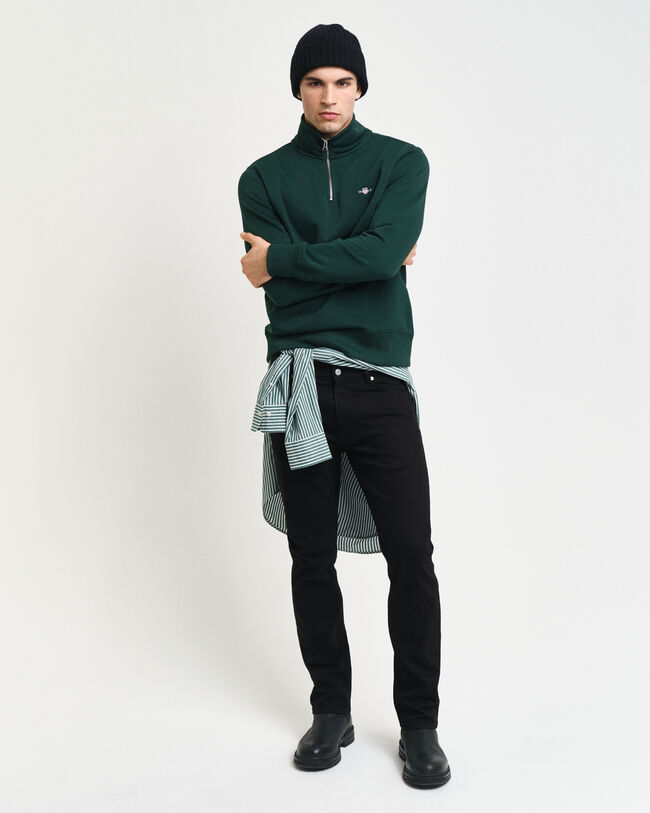 Shield‑collegepaita, jossa vetoketju pääntiellä