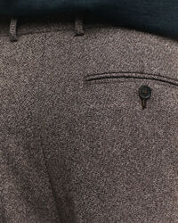 Relaxed fit ‑mitoitetut villakankaiset Mouliné-puvunhousut