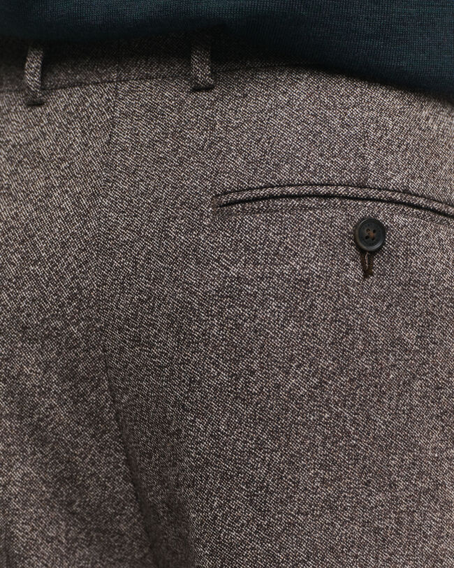 Relaxed fit ‑mitoitetut villakankaiset Mouliné-puvunhousut