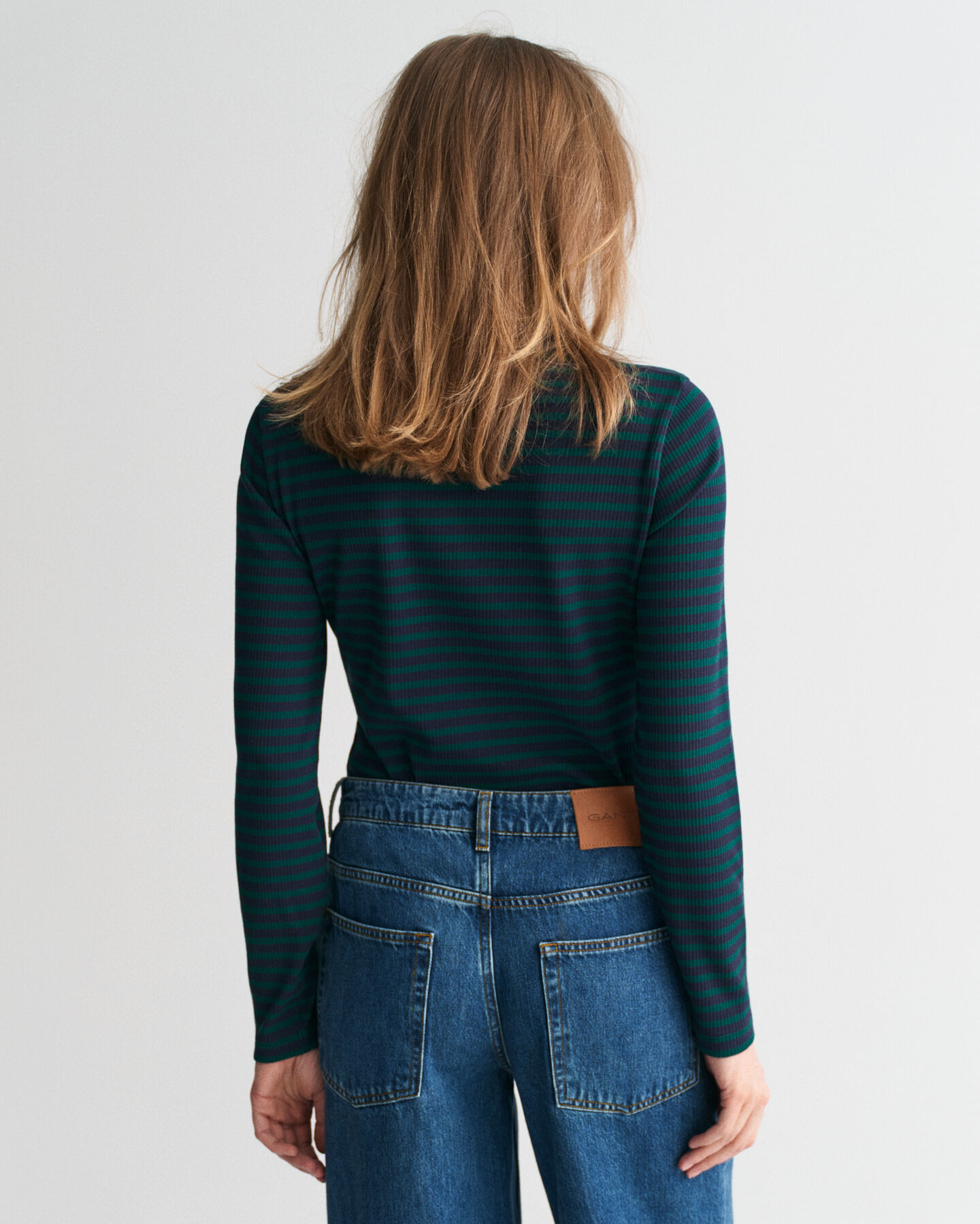 Pitkähihainen raidallinen joustinneulepoolo