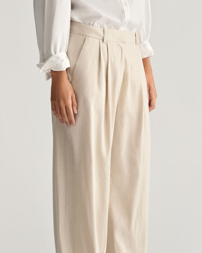 Relaxed fit ‑mitoitetut huolitellut joustopellavahousut