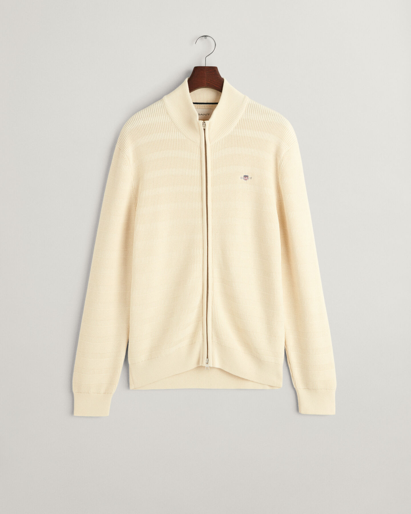 Kohopintainen raidallinen vetoketjullinen puuvillaneuletakki