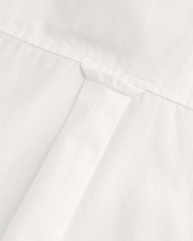 Relaxed fit ‑mitoitettu vajaamittainen paita