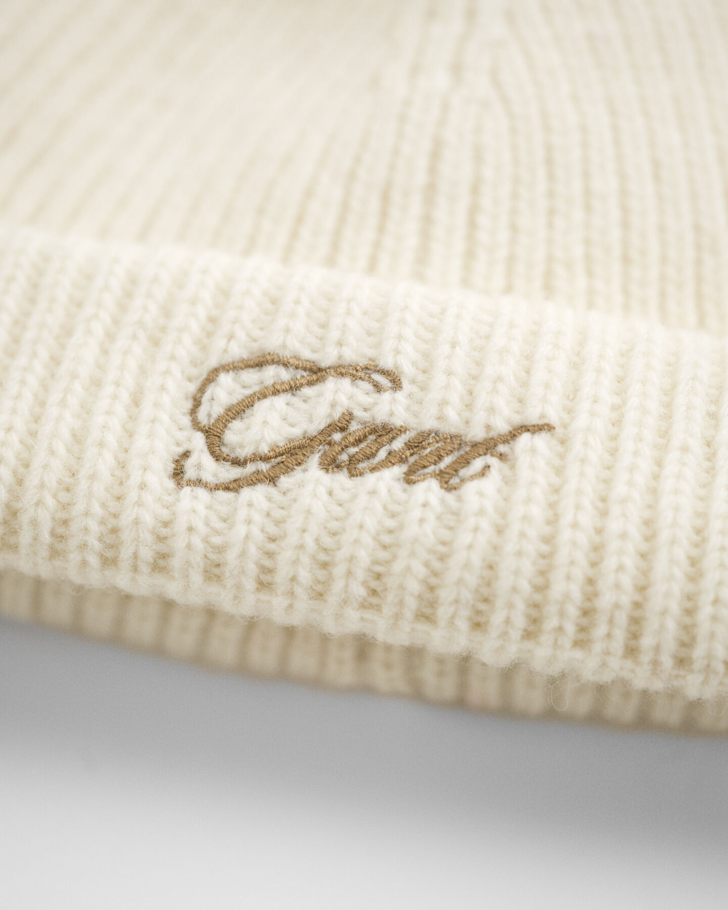 Baby‑malliston korvaläpällinen tupsupipo