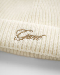 Baby‑malliston korvaläpällinen tupsupipo