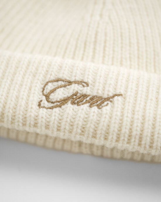 Baby‑malliston korvaläpällinen tupsupipo