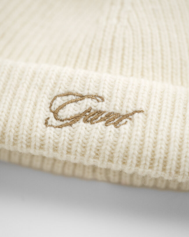 Baby‑malliston korvaläpällinen tupsupipo