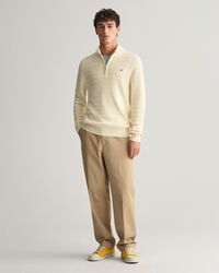 Raidallinen kohopintainen vetoketjukauluksellinen puuvillaneule