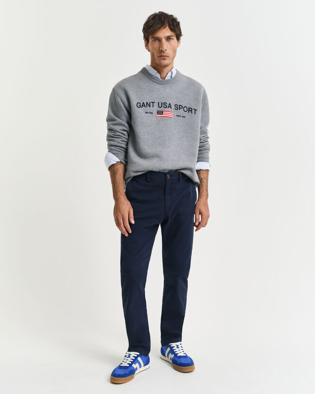 Slim fit ‑mitoitetut dobby-kudotut chinot