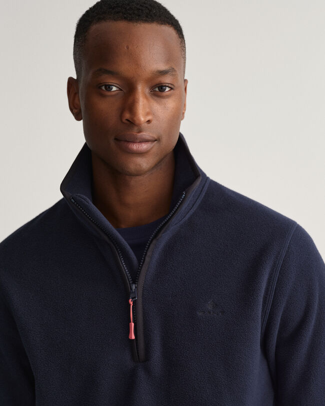 Kevyt fleecepusero puolivetoketjulla