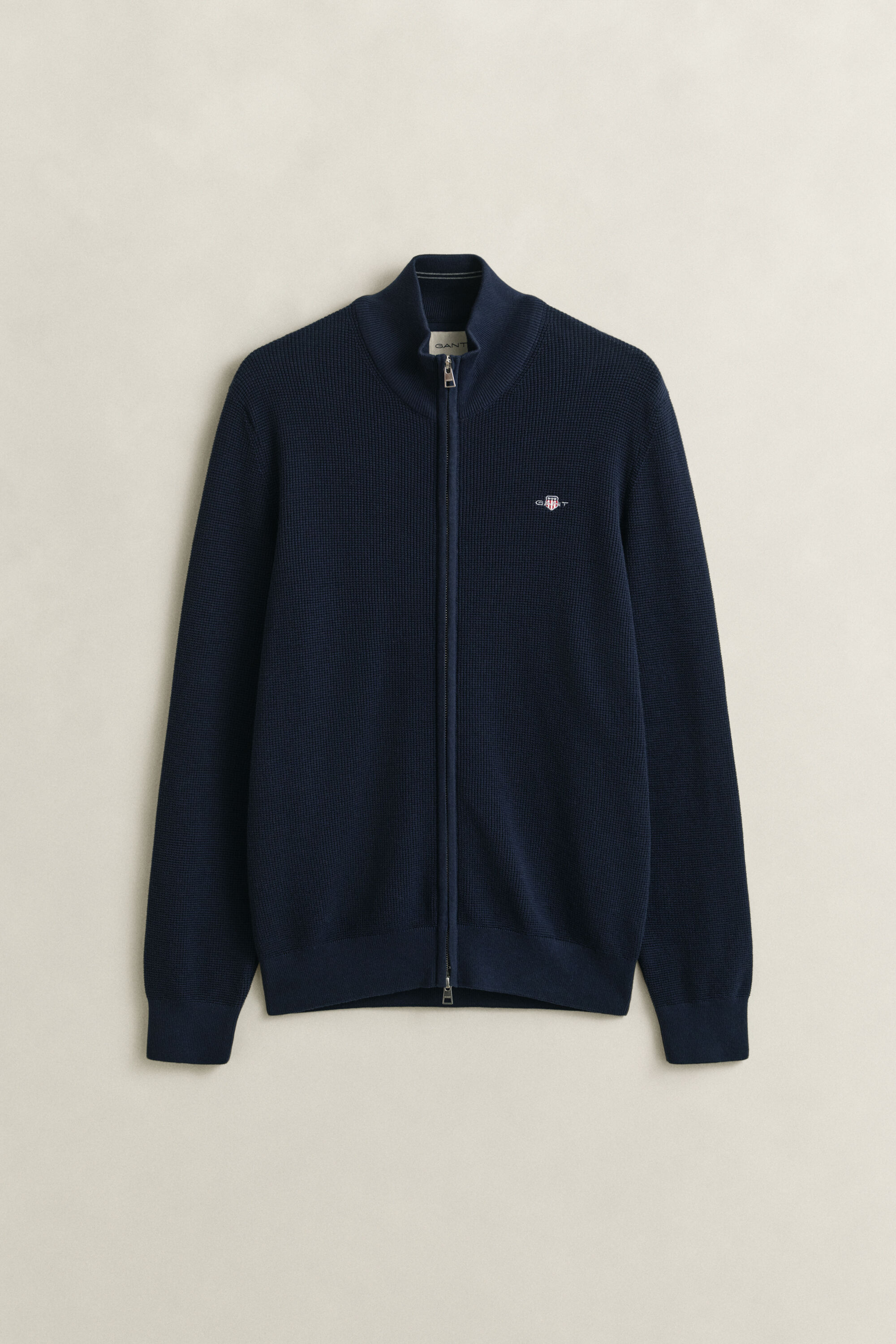 Kohopintainen vetoketjullinen puuvillaneuletakki