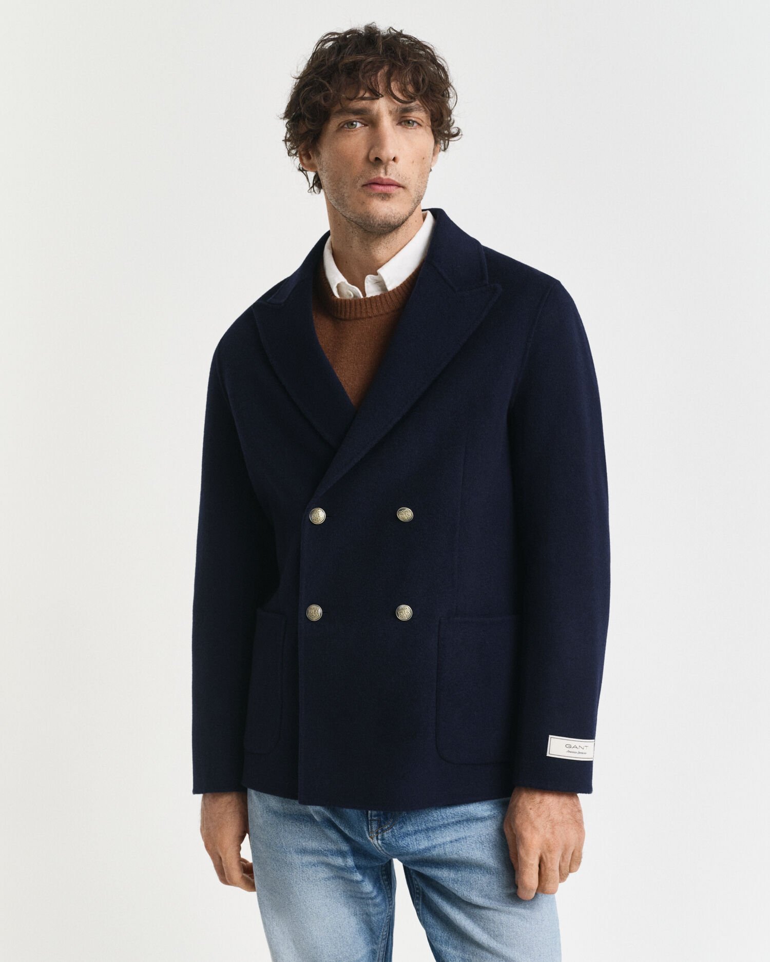 Käsin tikattu klubitakki