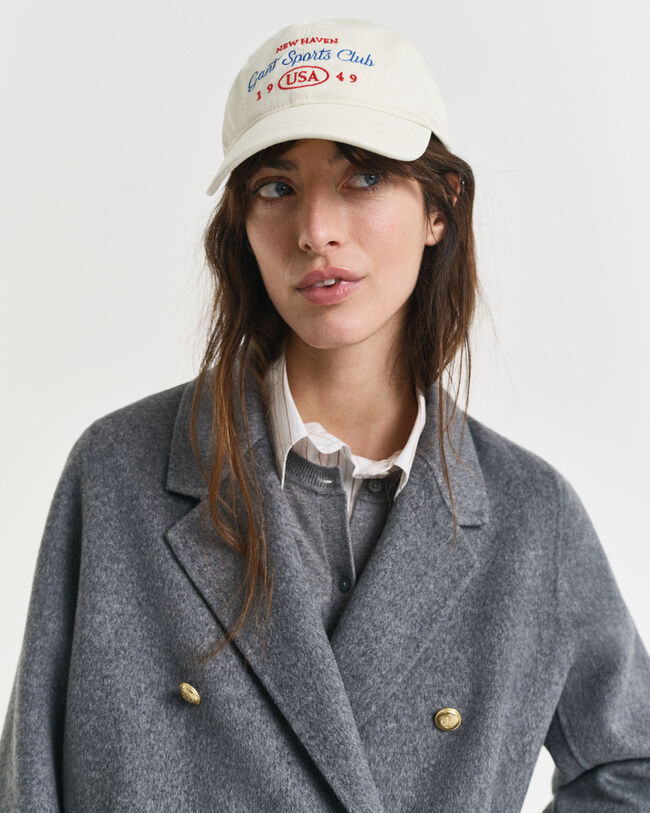 Käsin tikattu kansitakki