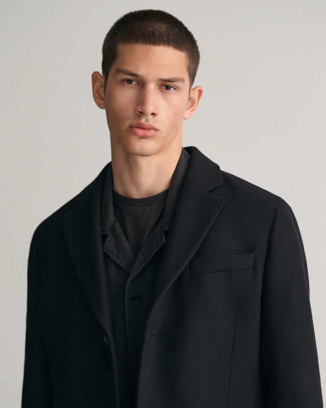 Hyvin istuva klassinen päällystakki villasta