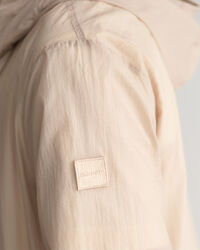 Taskuun pakattava kevyt Windbreaker-takki