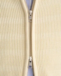 Kohopintainen raidallinen vetoketjullinen puuvillaneuletakki