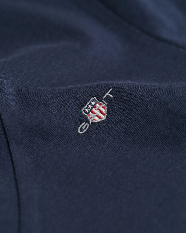 Shield-t‑paita, jossa v-pääntie